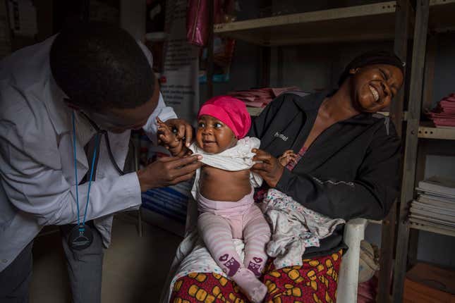 Beatrice, 1, getting a checkup in Yola, Nigeria, where thousands of children died every year from pneumonia.