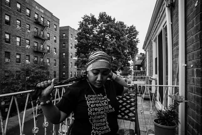 Cherry fixing her hijab at Daisy’s apartment in Queens. July 6, 2015.