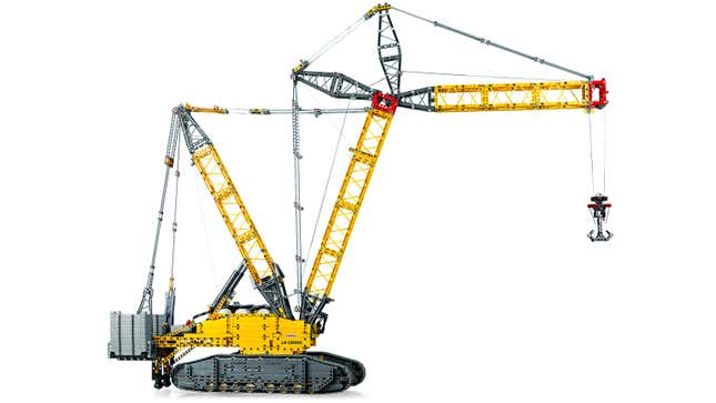 A side shot of the Lego Technic Liebherr Crawler Crane LR 13000 model with its crane arm slightly lowered.