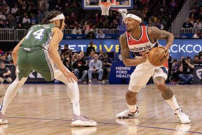 Mar 7, 2023; Detroit, Michigan, USA; Detroit Pistons guard R.J. Hampton (14) defends against Washington Wizards guard Bradley Beal (3) in the first quarter at Little Caesars Arena.