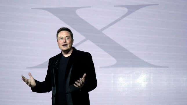 Elon Musk, CEO of Tesla Motors Inc., introduces the Model X car at the company’s headquarters September 29, 2015, in Fremont, California.