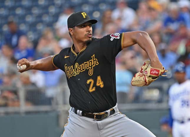 Aug 28, 2023; Kansas City, Missouri, USA;  Pittsburgh Pirates starting pitcher Johan Oviedo (24) delivers a pitch in the first inning against the Kansas City Royals at Kauffman Stadium.