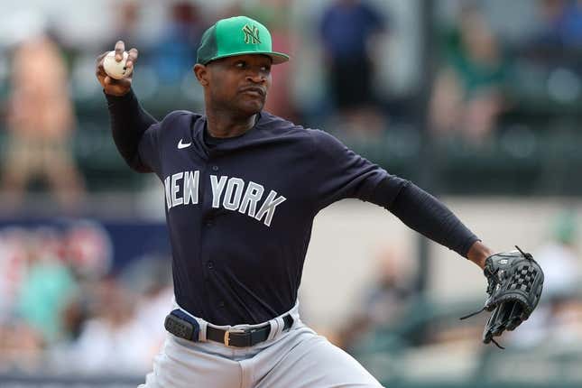 Mar 17, 2023; Lakeland, Florida, USA;  New York Yankees starting pitcher Domingo German (0) throws a pitch against the Detroit Tigers in the first inning during spring training at Publix Field at Joker Marchant Stadium.