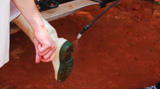 Cleaning shoes in ebola clinic