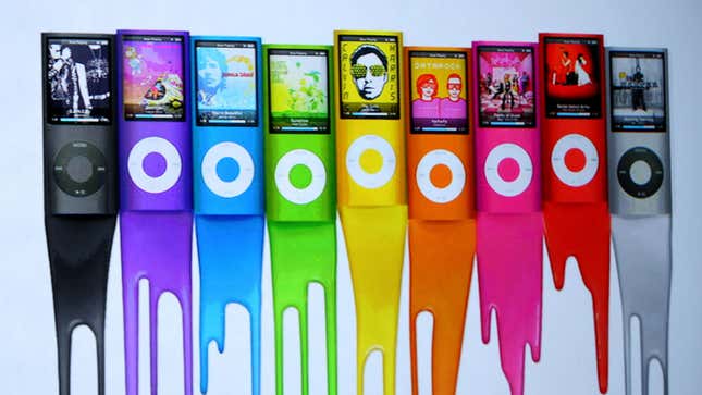 A row of iPod Minis slowly bleed their colorways into the bottom of the frame in a 2009 advertisement.