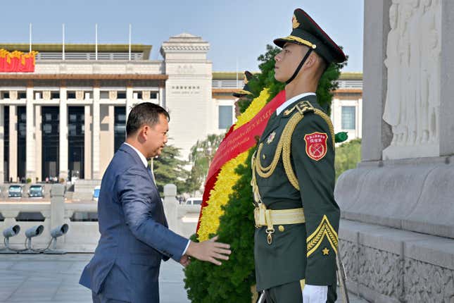 In this photo released by Xinhua News Agency, Cambodian Prime Minister Hun Manet lays a wreath at the Monument to the People&#39;s Heroes on the Tiananmen Square in Beijing on Thursday, Sept. 14, 2023. Cambodia&#39;s new prime minister, Hun Manet, has arrived in Beijing on his first official trip abroad since taking office last month. He arrived on Thursday and is scheduled to meet with Chinese leader Xi Jinping on a visit that demonstrates Cambodia&#39;s warm relations with China, its closest political and economic ally. (Yue Yuewei/Xinhua via AP)