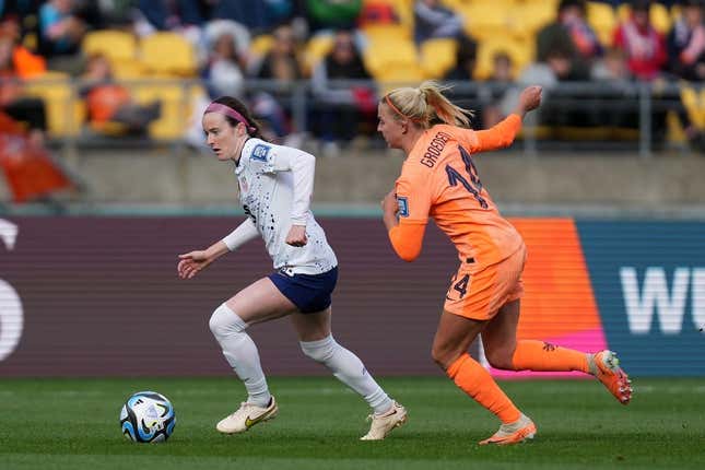 Jul 27, 2023; Wellington, NZL; United States midfielder Rose Lavelle (16) kicks the ball past Netherlands midfielder Jackie Groenen (14) during the second half in a group stage match for the 2023 FIFA Women&#39;s World Cup at Wellington Regional Stadium.