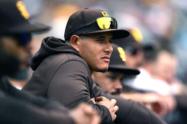 May 17, 2023; San Diego, California, USA; San Diego Padres third baseman Manny Machado (13) looks on from the dugout during the eighth inning against the Kansas City Royals at Petco Park.