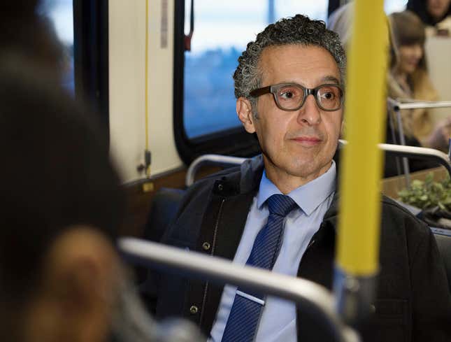 Image for article titled Report: On Second Glance Guy On Bus Not Actually Stanley Tucci