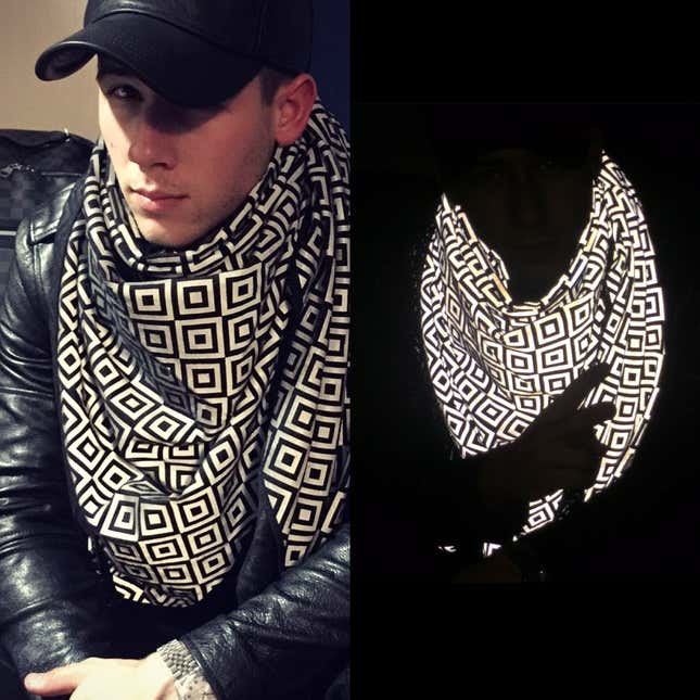Nick Jonas wearing his ISHU scarf.