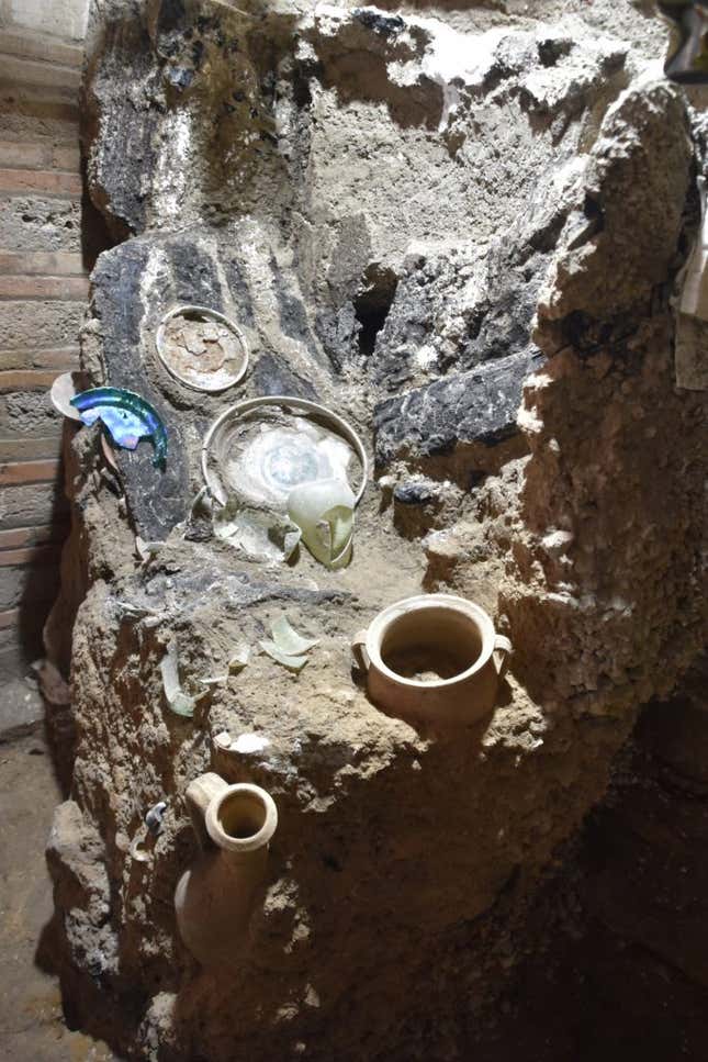 Plates and amphorae preserved in the volcanic ash in the house.