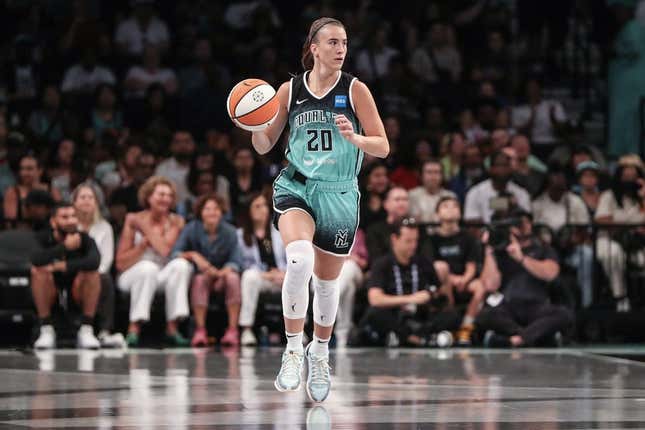 Aug 6, 2023; Brooklyn, New York, USA; New York Liberty guard Sabrina Ionescu (20) brings the ball up in the first quarter against the Las Vegas Aces at Barclays Center.