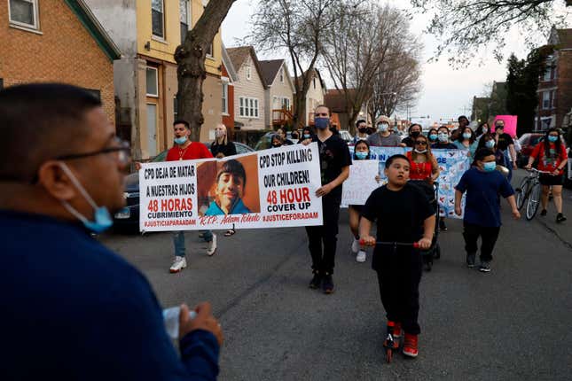 In this Tuesday, April 6, 2021 file photo, members of Chicago’s Little Village Community Council march to protest against the death of 13-year-old Adam Toledo, who was shot by a Chicago Police officer at about 2 a.m. on March 29 in an alley west of the 2300 block of South Sawyer Avenue near Farragut Career Academy High School. Chicago police officers will no longer be allowed to chase people on foot simply because they run away or give chase over minor offenses, the department said Tuesday, June 21, 2022, more than a year after two foot pursuits ended with officers fatally shooting a 13-year-old boy and 22-year-old man.