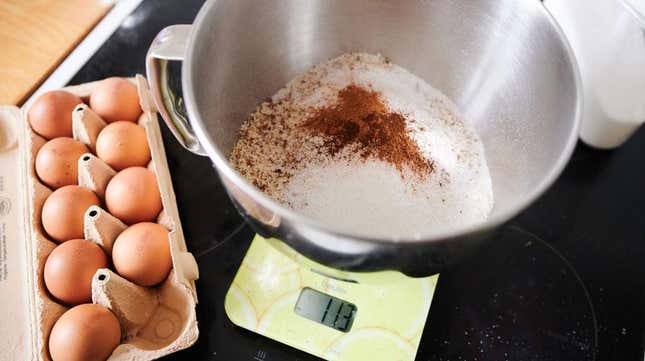 Large mixing bowl and eggs on top of food scale