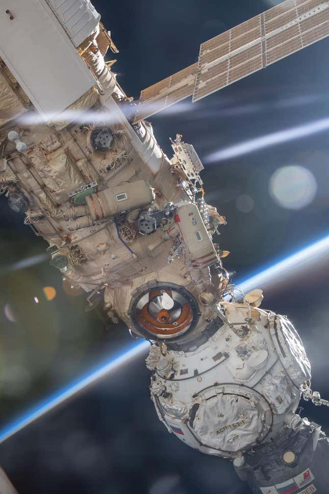 Cosmonauts work on the International Space Station in April 2022.