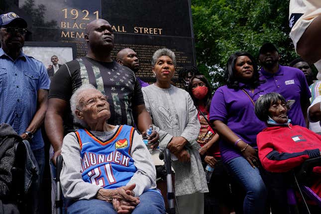 Tulsa race massacre survivors Viola Fletcher, left, and Lessie Benningfield Randle, right, listen during a rally marking centennial commemorations of a two-day assault by armed white men on Tulsa’s prosperous Black community of Greenwood, Friday, May 28, 2021, in Tulsa, Okla. 