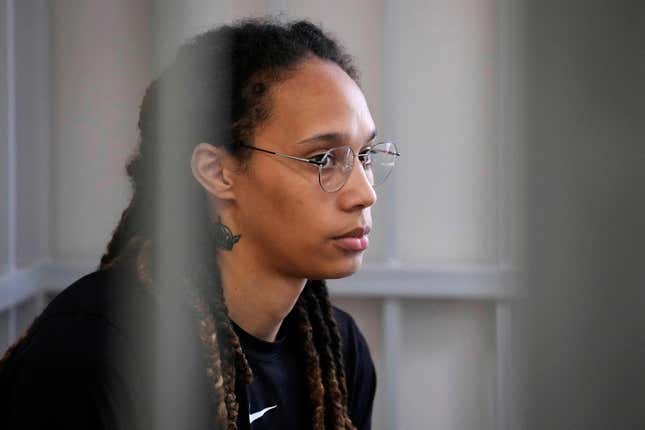 Brittney Griner sits inside a defendants’ cage before a hearing at the Khimki Court, outside Moscow on July 27, 2022. (Photo by Alexander Zemlianichenko / POOL / AFP) (Photo by ALEXANDER ZEMLIANICHENKO/POOL/AFP via Getty Images)