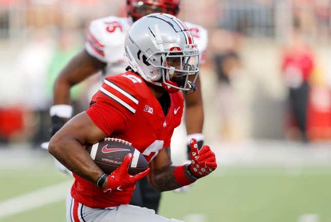 Sep 16, 2023; Columbus, Ohio, USA; Ohio State Buckeyes wide receiver Emeka Egbuka (2) runs for a touchdown during the second quarter against the Western Kentucky Hilltoppers at Ohio Stadium.