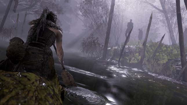 a woman paddles a kayak down a stream on a foggy night in hellblade senuas sacrifice on xbox game pass