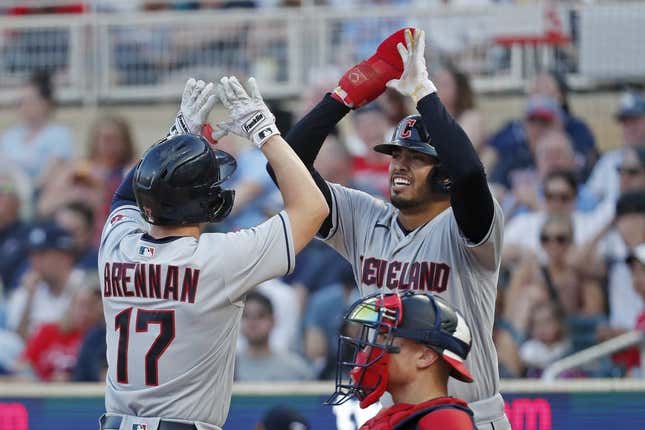 Jun 3, 2023; Minneapolis, Minnesota, USA; Cleveland Guardians first baseman Gabriel Arias (13) celebrates the home run by right fielder Will Brennan (17) that sent them both in against the Minnesota Twins in the seventh inning at Target Field.