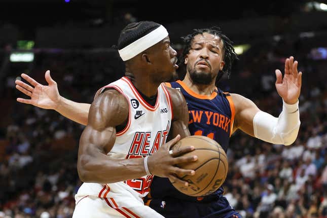 Mar 22, 2023; Miami, Florida, USA; Miami Heat forward Jimmy Butler (22) drives to the basket against New York Knicks guard Jalen Brunson (11) during the third quarter at Miami-Dade Arena.