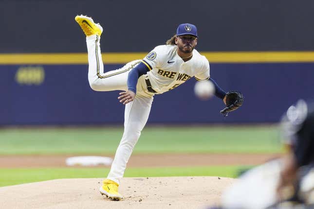 May 8, 2023; Milwaukee, Wisconsin, USA;  Milwaukee Brewers pitcher Freddy Peralta (51) throws a pitch during the first inning against the Los Angeles Dodgers at American Family Field.