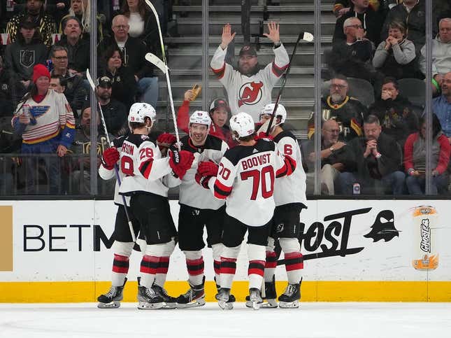 Mar 3, 2023; Las Vegas, Nevada, USA; New Jersey Devils left wing Miles Wood (44) celebrates with team mates after scoring a goal against the Vegas Golden Knights during the third period at T-Mobile Arena.