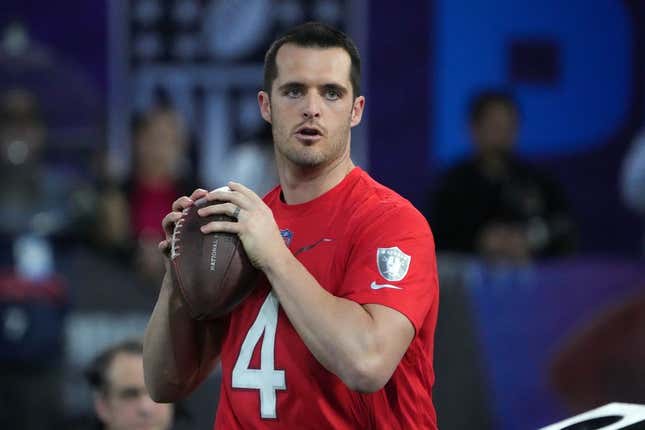 Feb 2, 2023; Henderson, NV, USA; Las Vegas Raiders quarterback Derek Carr (4) throws the ball during the Pro Bowl Skills competition at the Intermountain Healthcare Performance Facility.