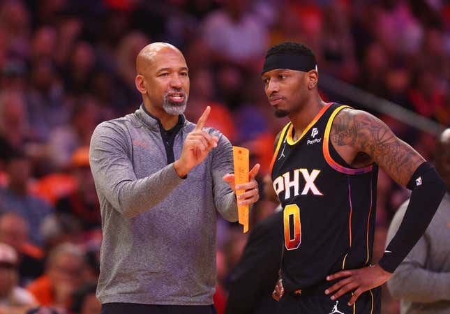 Apr 25, 2023; Phoenix, Arizona, USA; Phoenix Suns head coach Monty Williams with forward Torrey Craig (0) against the Los Angeles Clippers during game five of the 2023 NBA playoffs at Footprint Center.