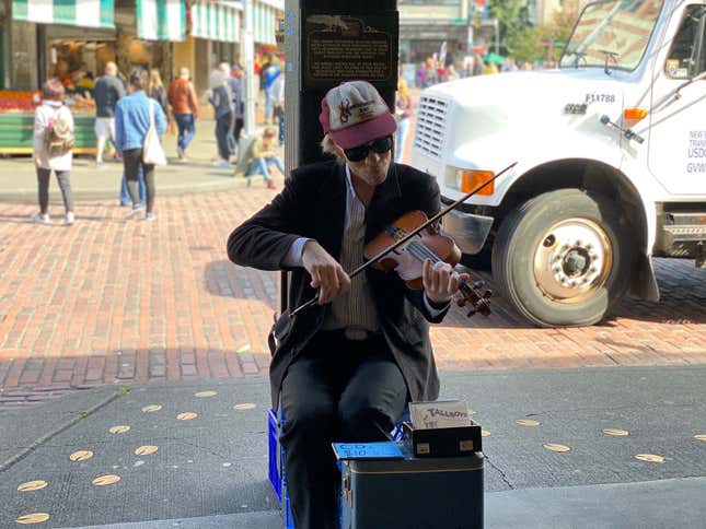 a performer at the Seattle market