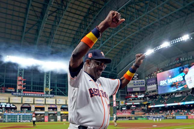 Houston Astros’ Dusty Baker Jr. (12) celebrates after a baseball game against the Seattle Mariners Tuesday, May 3, 2022, in Houston. The Astros won 4-0 giving Baker 2,000 career wins.
