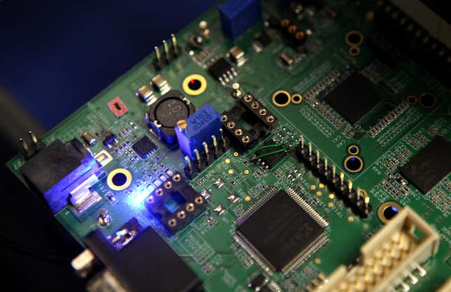 Semiconductors are seen on a circuit board.