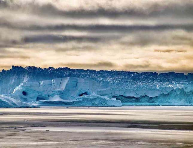 An iceberg calved from Dalk Glacier floats in Thala Fjord.