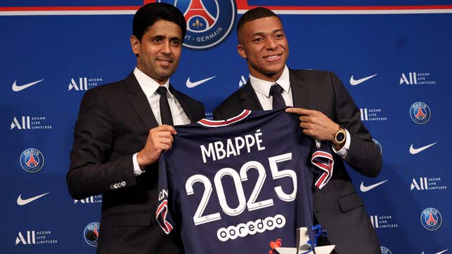 President of PSG Nasser Al Khelaifi and Kylian Mbappé during a press conference about Mbappé’s new contract with PSG.