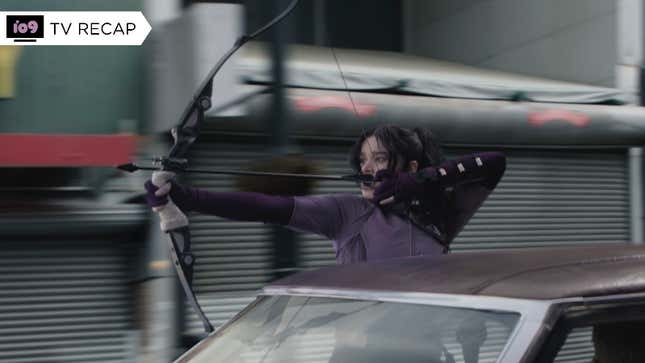 Hailee Steinfeld's Kate fires an arrow while sitting in the window of a moving car.