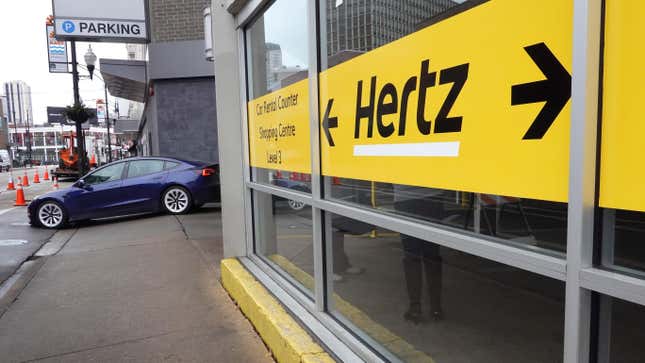 A sign marks the location of a Hertz car rental facility on February 07, 2023 in Chicago, Illinois.