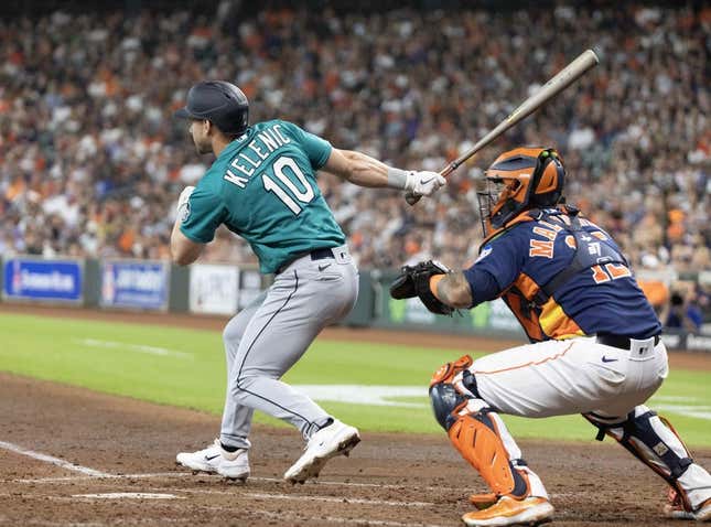 Jul 9, 2023; Houston, Texas, USA; Seattle Mariners left fielder Jarred Kelenic (10) hits a RBI double against the Houston Astros in the fourth inning at Minute Maid Park.