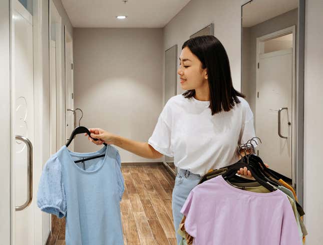 Image for article titled Woman Brings Clothes To Dressing Room To See What They’ll Look Like Scattered Across Floor