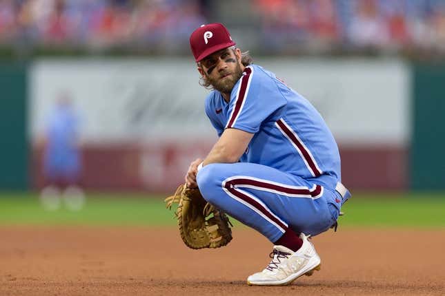 Aug 10, 2023; Philadelphia, Pennsylvania, USA; Philadelphia Phillies designated hitter Bryce Harper (3) looks on during a break in action in the first inning against the Washington Nationals at Citizens Bank Park.