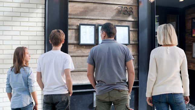 Image for article titled Family Stands In Tense Silence As Dad Considers Menu Posted Outside Bistro