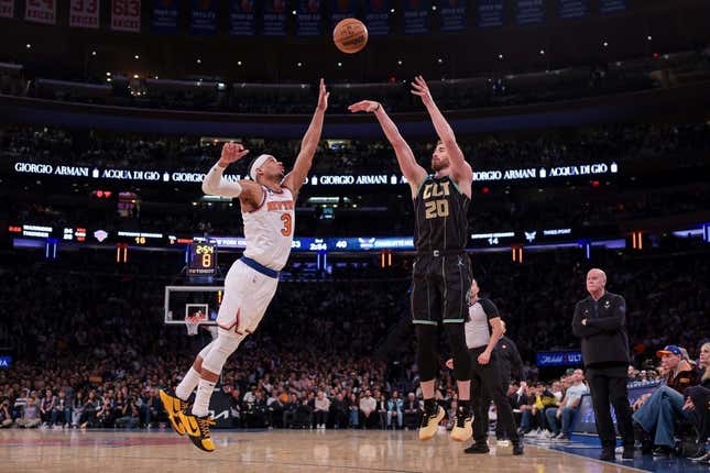 Mar 7, 2023; New York, New York, USA; Charlotte Hornets forward Gordon Hayward (20) shoots the ball against the New York Knicks against New York Knicks guard Josh Hart (3) during the first half at Madison Square Garden.