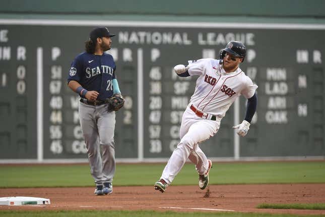 May 16, 2023; Boston, Massachusetts, USA; Boston Red Sox right fielder Alex Verdugo (99) rounds third base during the first inning against the Seattle Mariners at Fenway Park.
