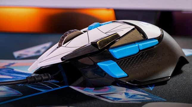 The Logitech G502 Hero mouse sits on top of a League of Legends mouse pad.