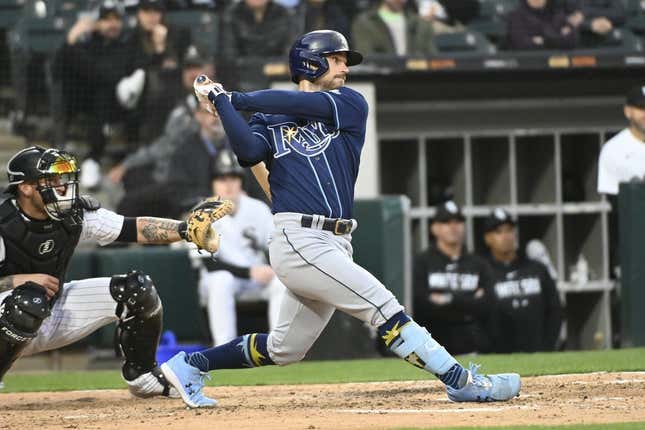 Apr 27, 2023; Chicago, Illinois, USA; Tampa Bay Rays second baseman Brandon Lowe (8) hits a two-run RBI single against the Chicago White Sox during the fifth inning at Guaranteed Rate Field.