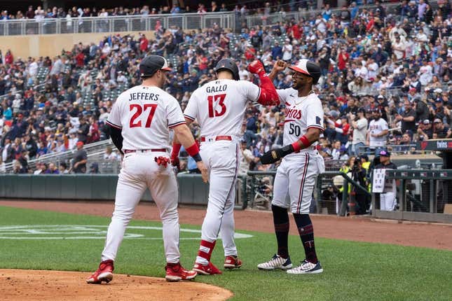 May 13, 2023; Minneapolis, Minnesota, USA; Minnesota Twins first baseman Joey Gallo (13) celebrates with catcher Ryan Jeffers (27) and left fielder Willi Castro (50) after hitting a three-run home run during the third inning against the Chicago Cubs at Target Field.
