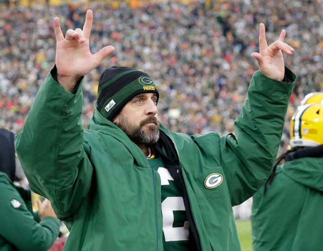 Green Bay Packers quarterback Aaron Rodgers (12) acknowledges the fans after he broke Brett Favre&#39;s team record for touchdown passes Sunday.

Syndication Packersnews