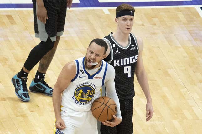 April 30, 2023; Sacramento, California, USA; Golden State Warriors guard Stephen Curry (30) celebrates in front of Sacramento Kings guard Kevin Huerter (9) during the fourth quarter in game seven of the 2023 NBA playoffs first round at Golden 1 Center.