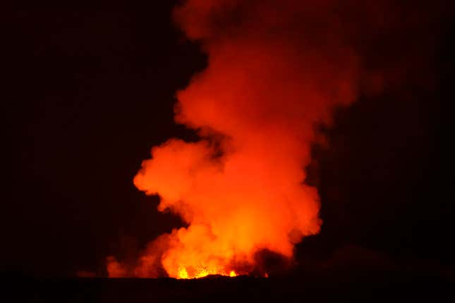 The Mauna Loa volcano erupts Saturday, Dec. 3, 2022, near Hilo, Hawaii.