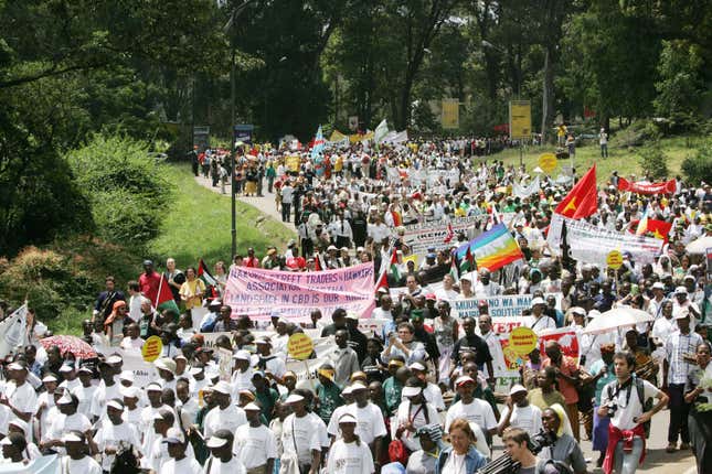 People march during the opening of the World Social Forum, Saturday, Jan. 20, 2007 in the Kenyan capital, Nairobi. More than 80,000 people gathered for an annual anti-capitalist conference in Kenya's capital on Saturday, hoping to network with other activists and protest global policies they say hurt the poor.