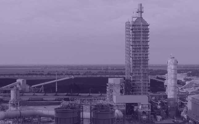 Petra Nova’s carbon-capture unit, in front of the large coal store that powers the WA Parish power plant.